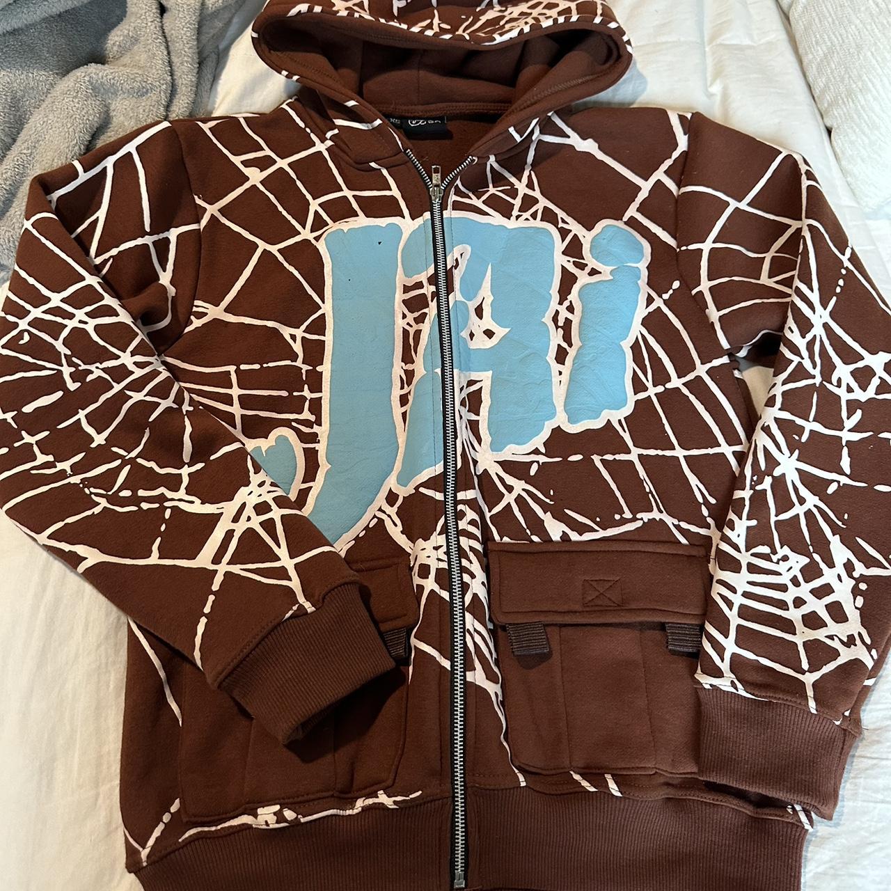 jai brown zip up with blue puff lettering, super... Depop