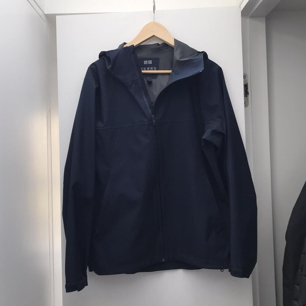 Uniqlo Rain Coat in Blue/Navy Size S (fits like a... - Depop