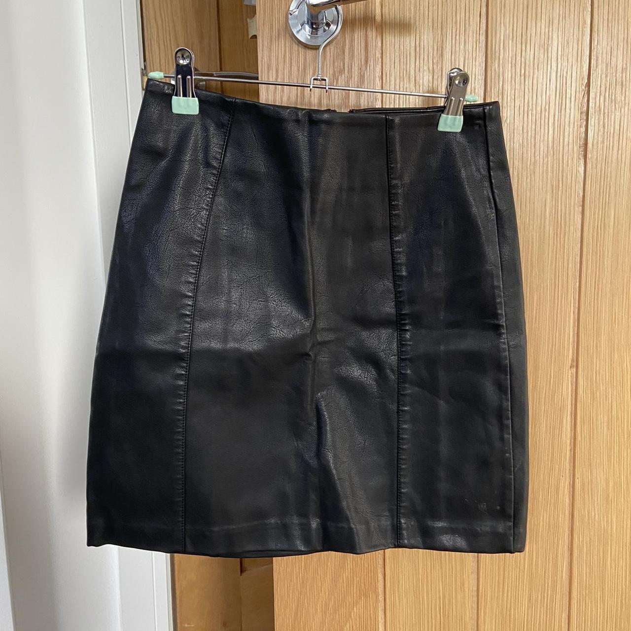 Black faux leather skirt - size UK 6 - zip up... - Depop