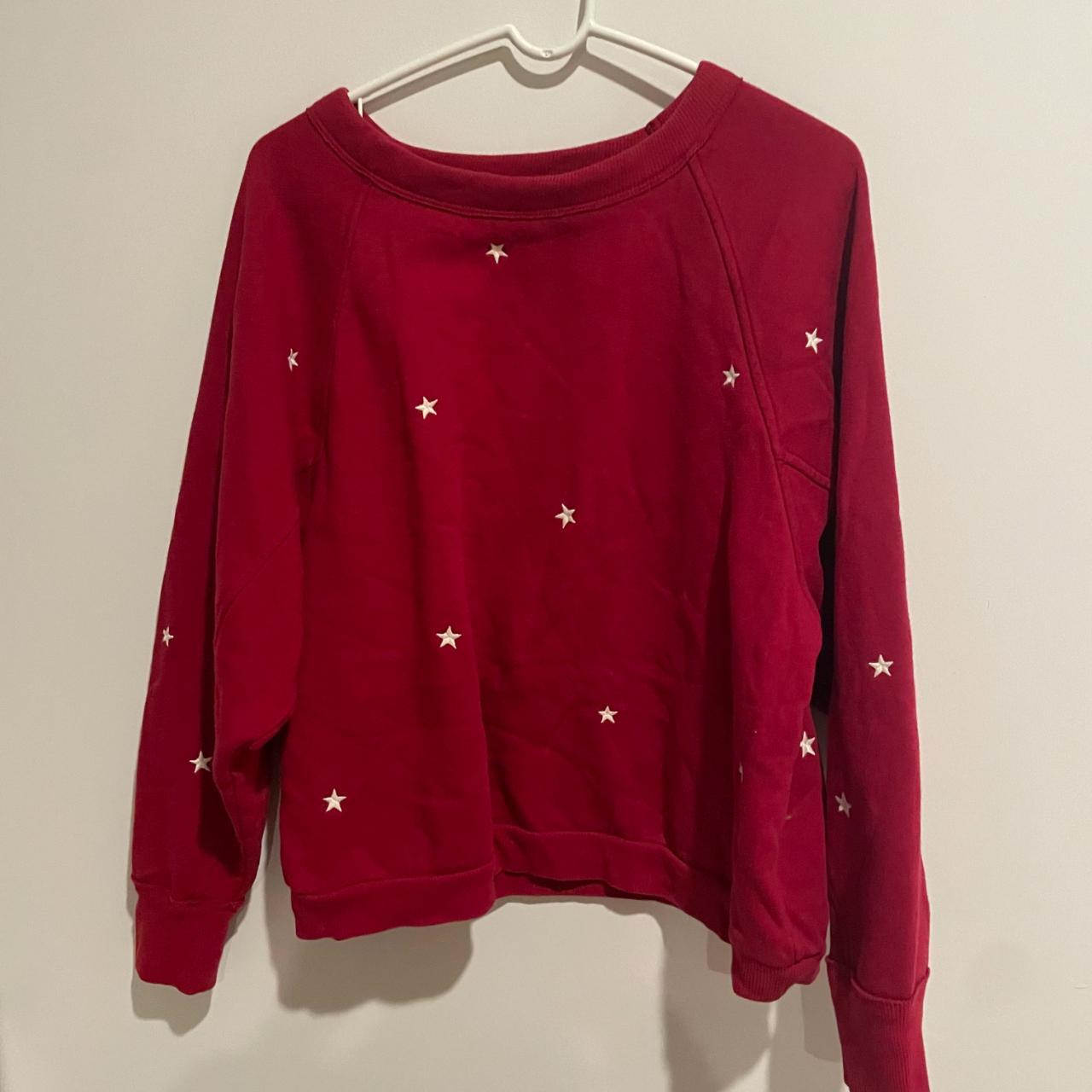 Red sweatshirt with store white stars