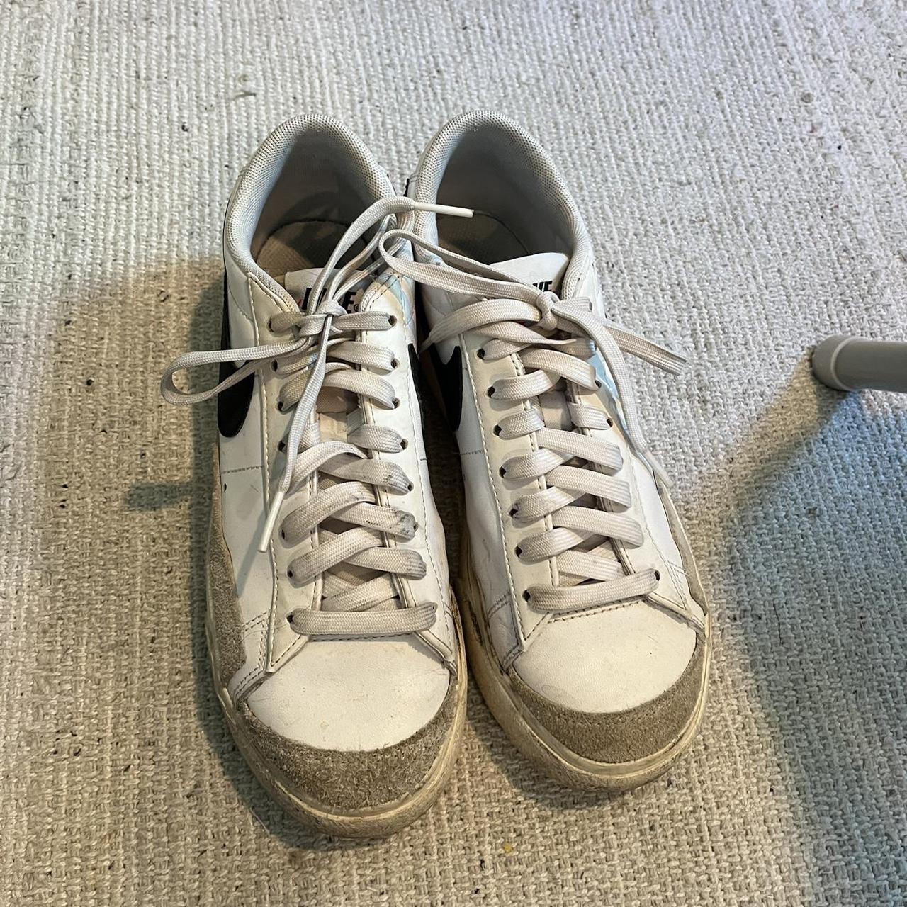 all white low top nike blazers