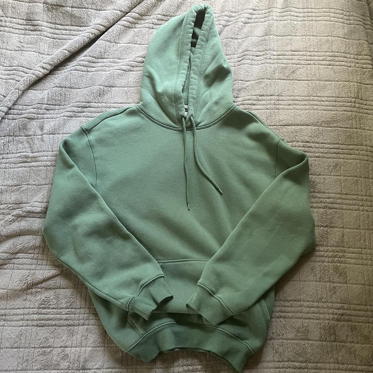 Super cute essential blank green H&M hoodie, color... - Depop