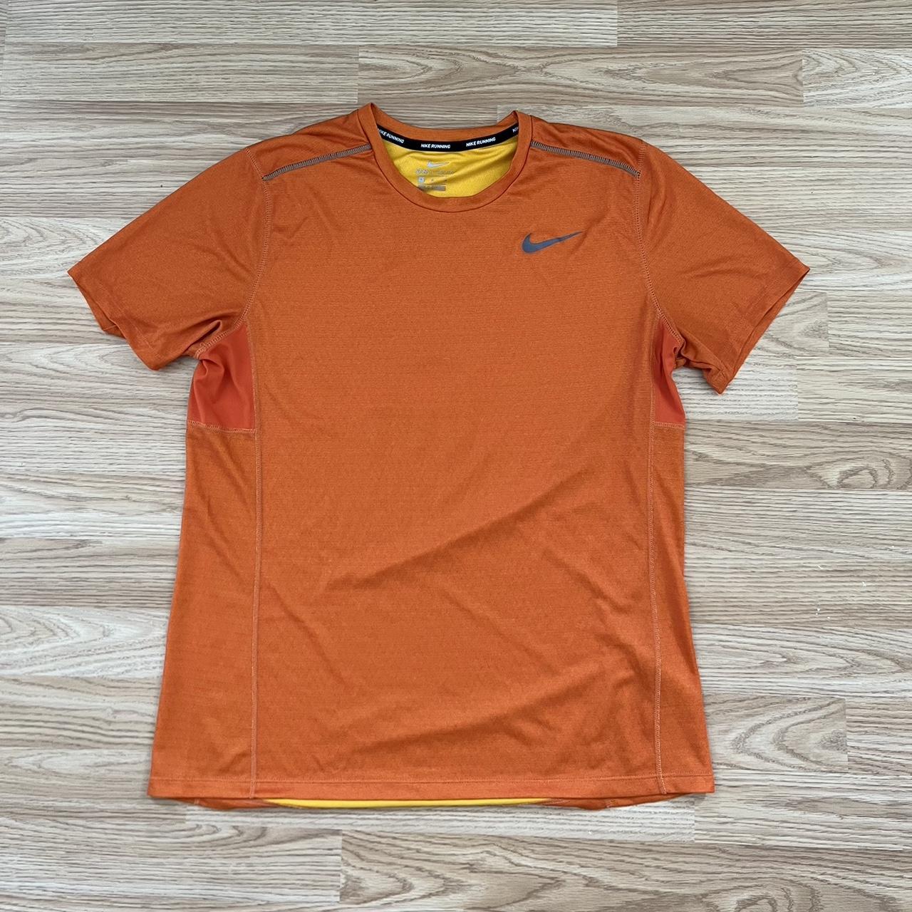 Nike dri fit top T shirt in orange Perfect... - Depop