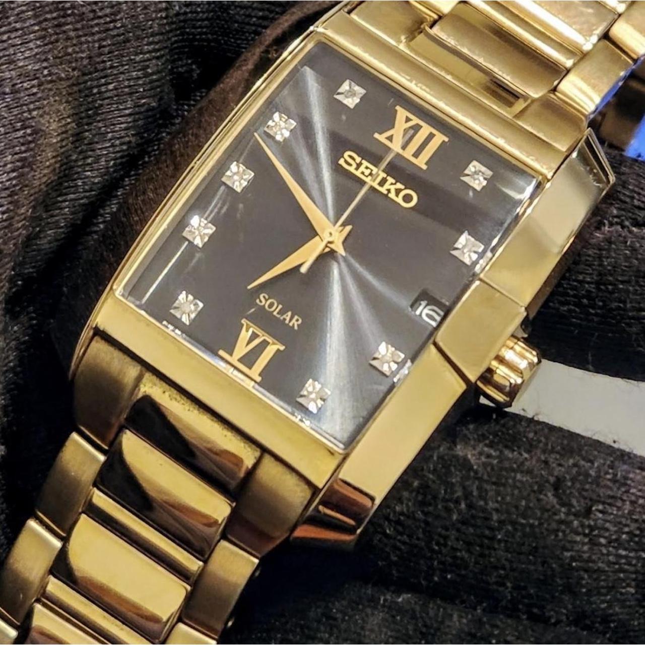 Seiko Men's gold watch with square black face Depop