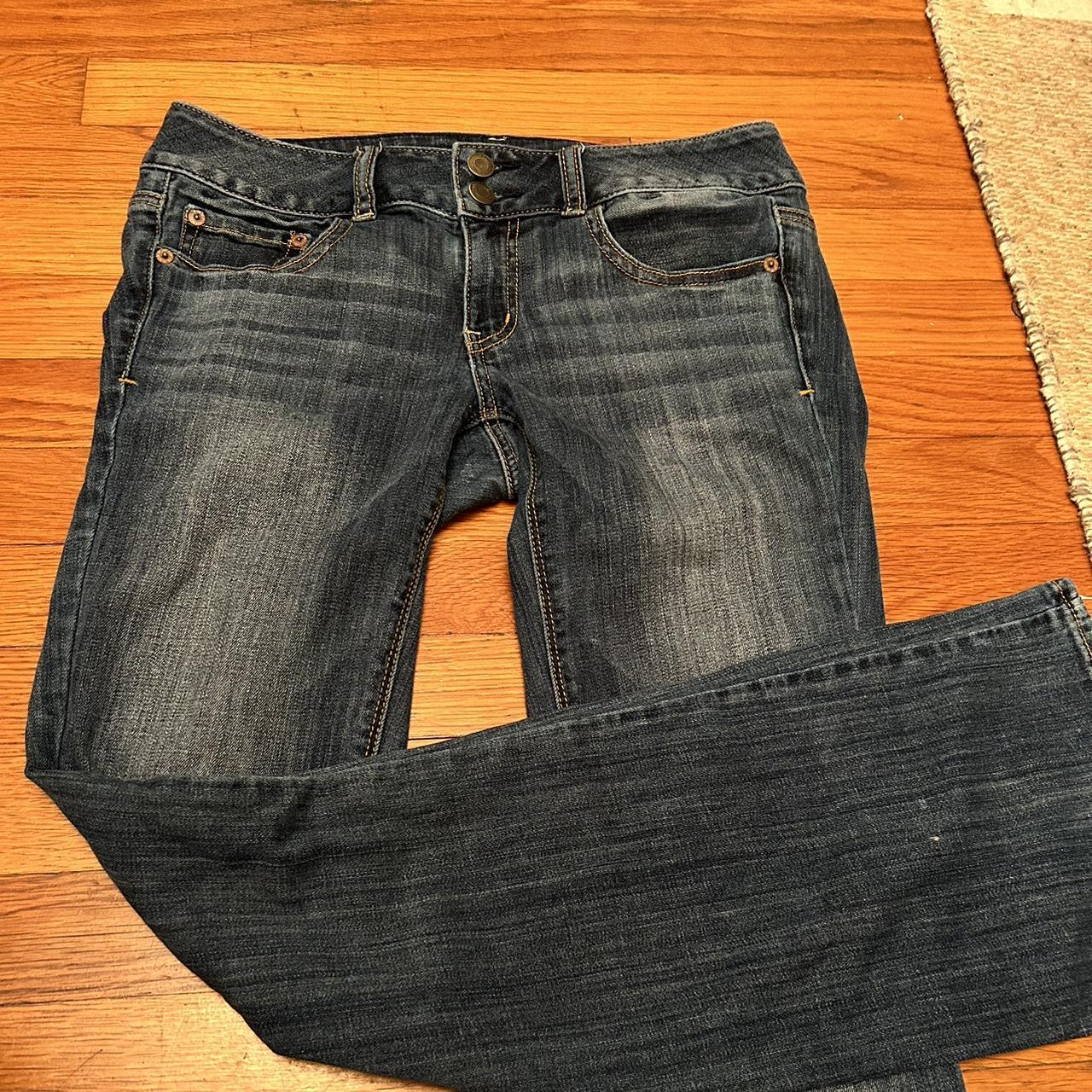 low waisted flared dark wash jeans - Depop