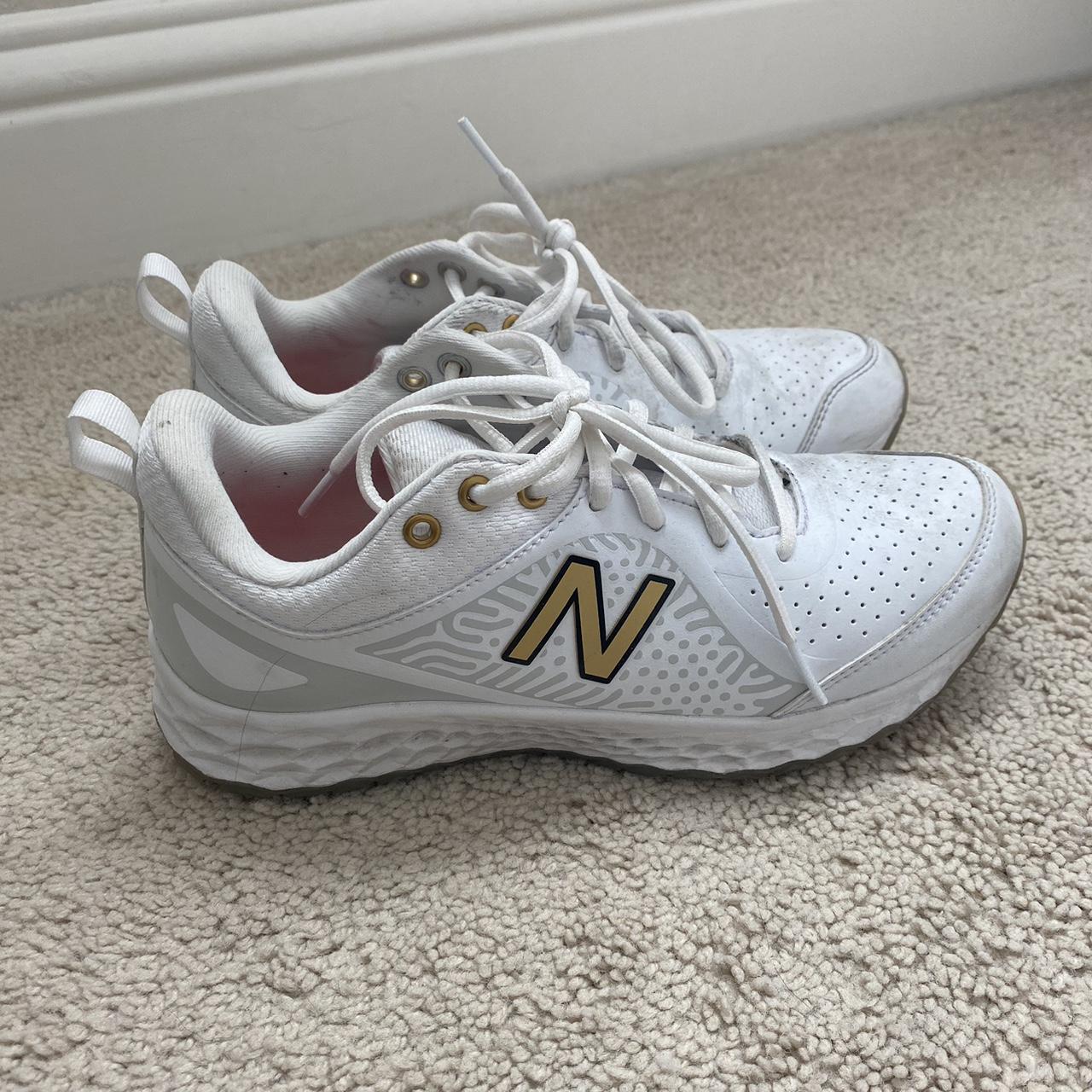 White and gold new balance sale turf shoes