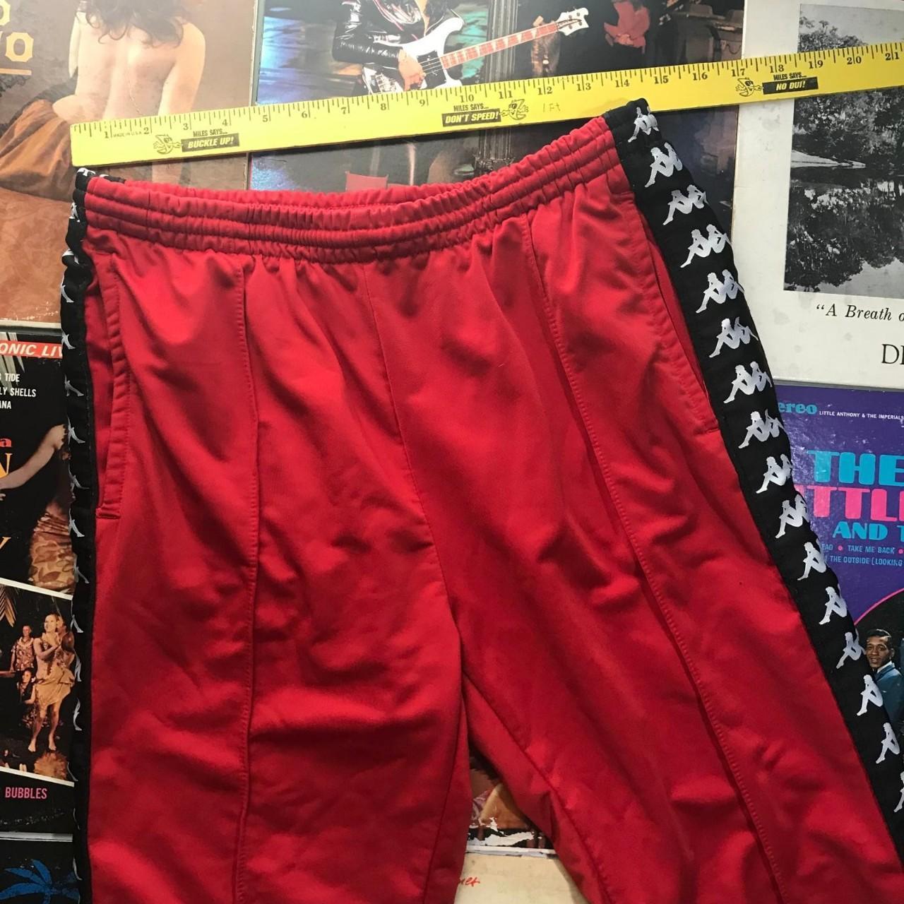 Red Kappa tear away pants. Cropped at the bottom.... Depop