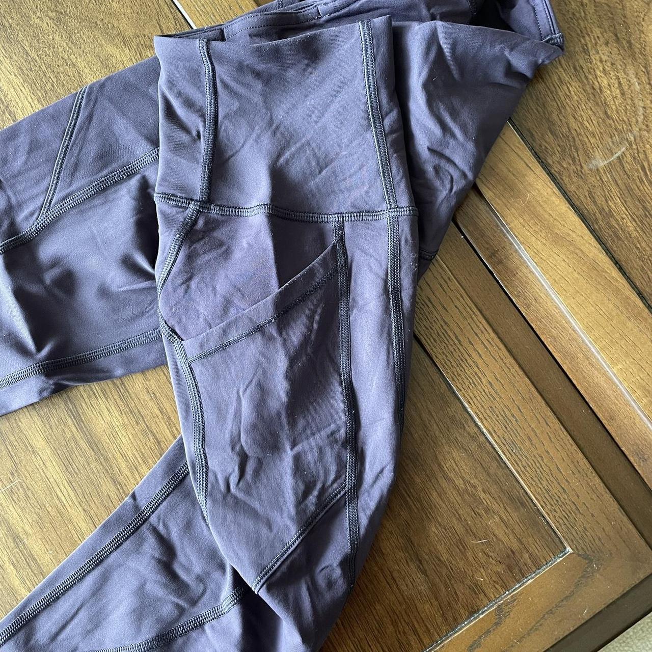 Lululemon dark purple leggings with pockets. Size 4.