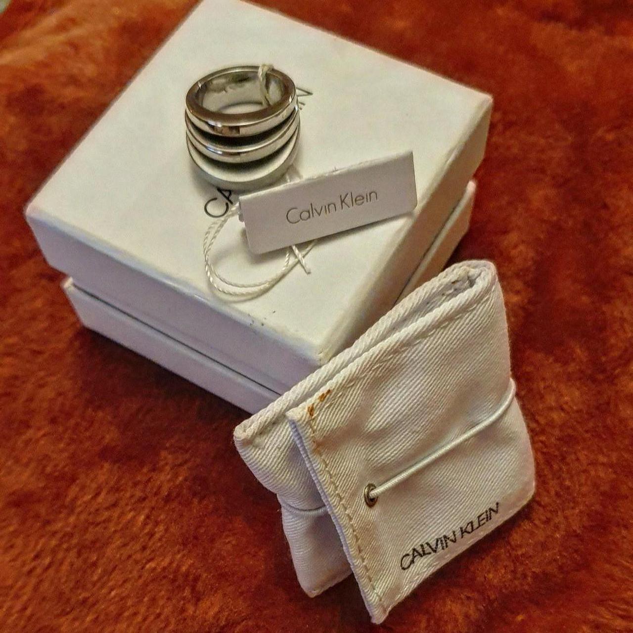 Metal Calvin Klein Ring, Brand New With Box. Very... - Depop