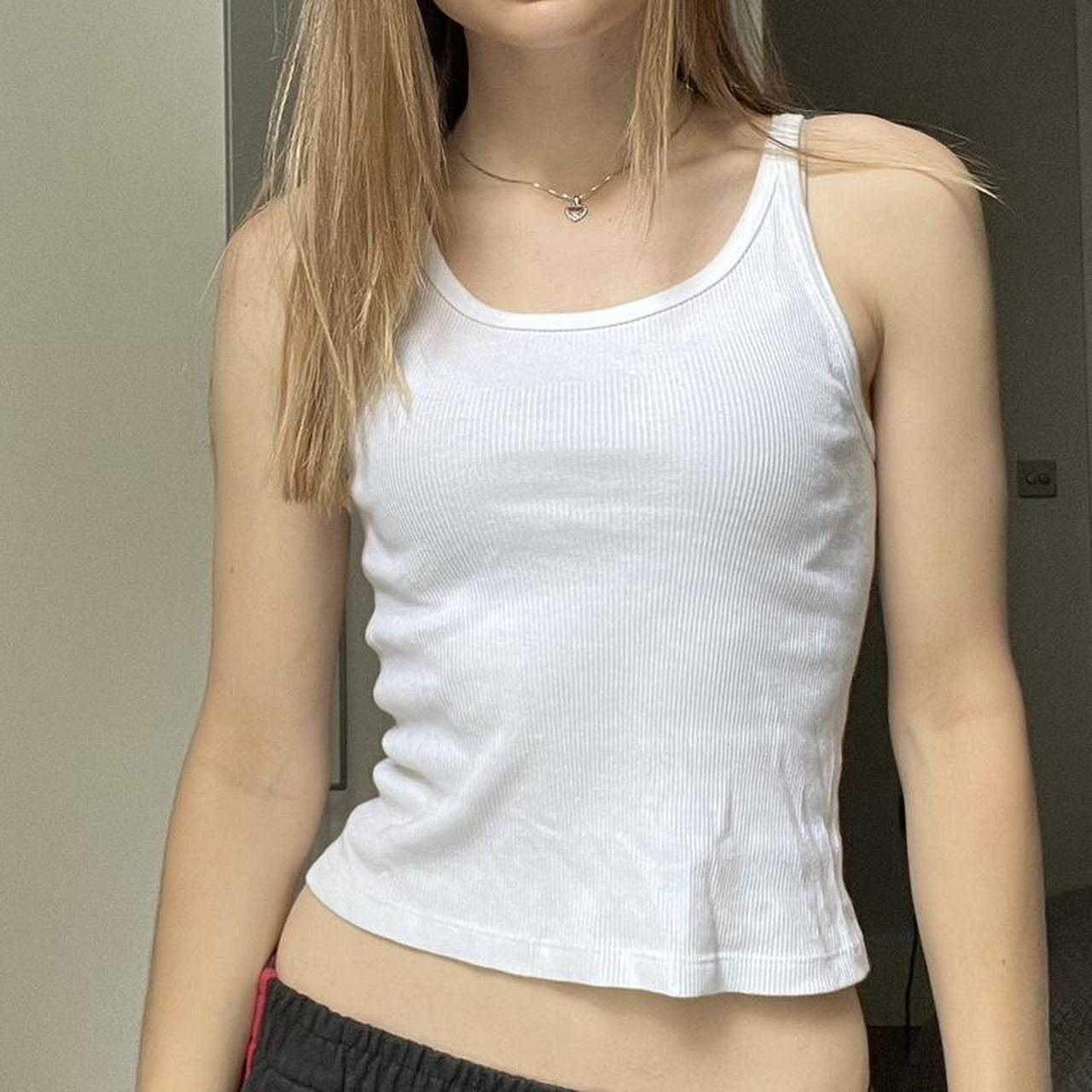 simple brandy melville white tank! So comfy and fits... Depop