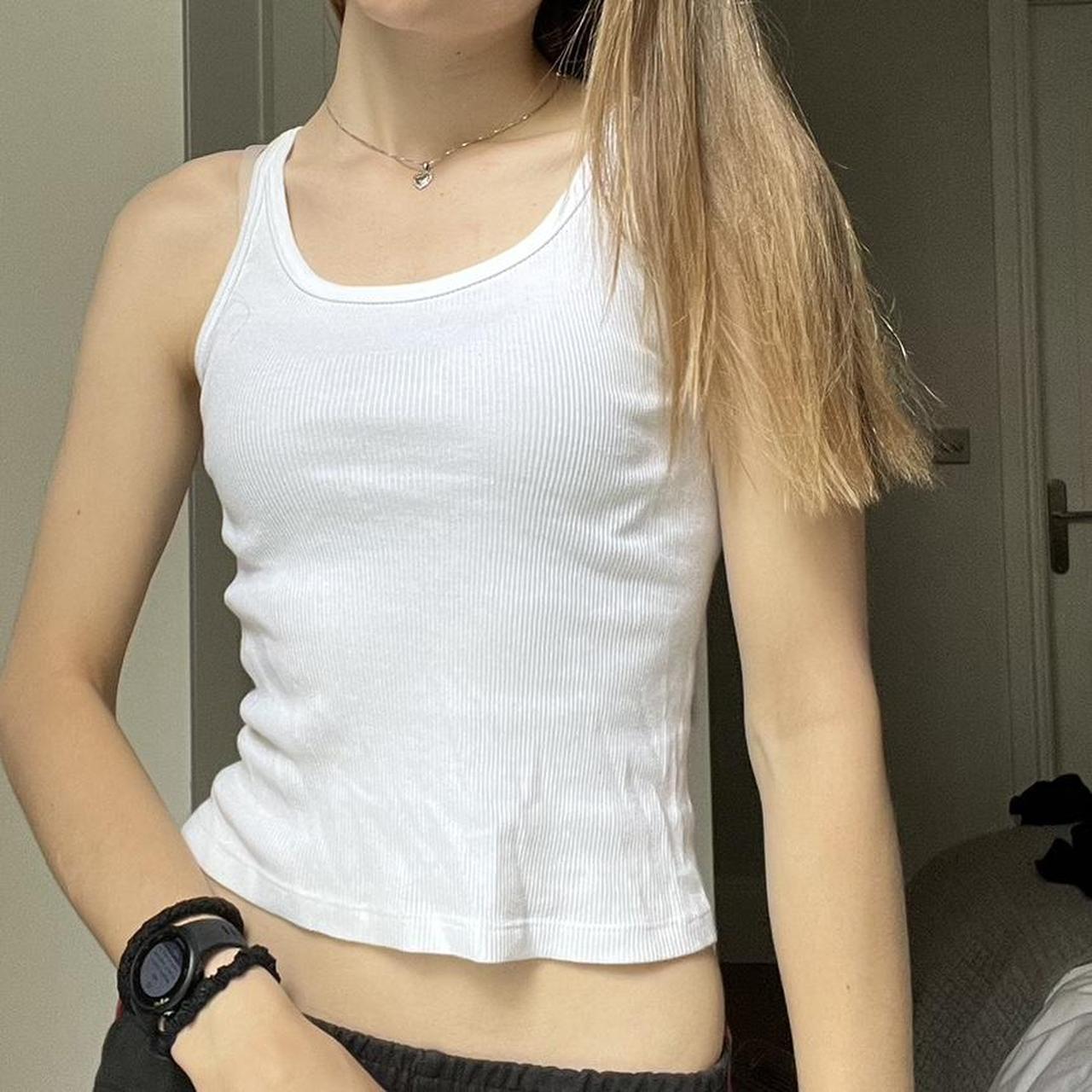 simple brandy melville white tank! So comfy and fits... Depop