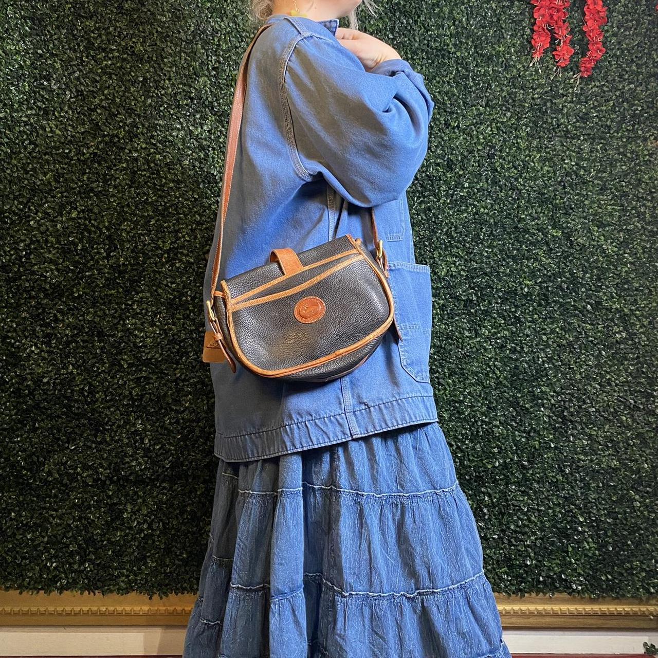 Dooney and Bourke black and brown leather satchel... Depop