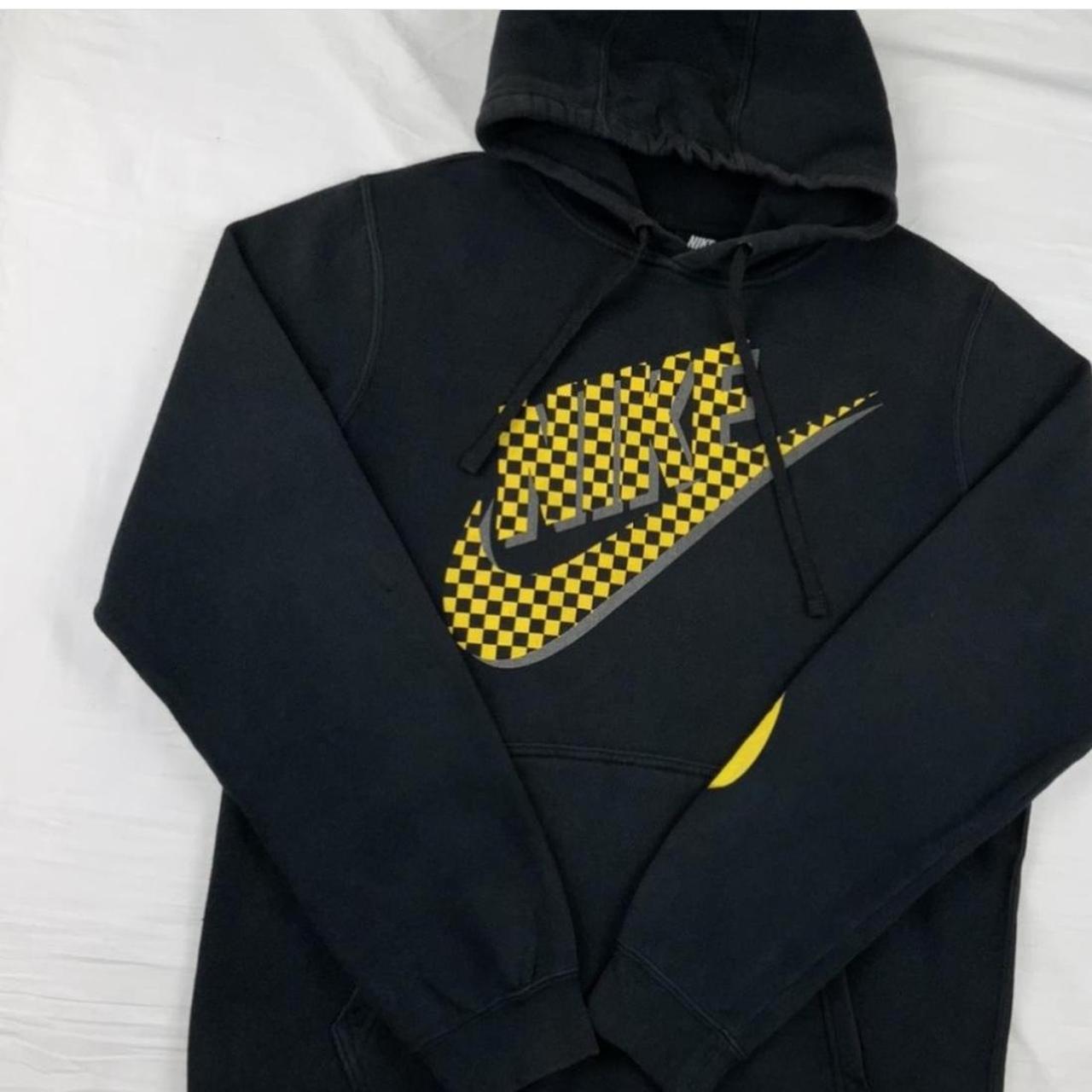 Nike black yellow checkered spell out and swoosh