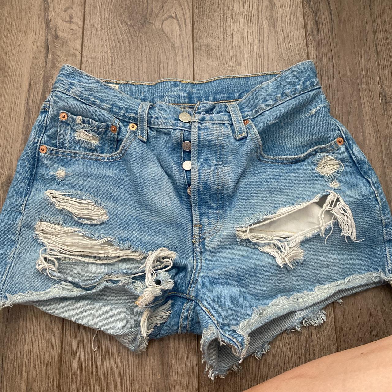 womens levi ripped shorts size -26 - Depop