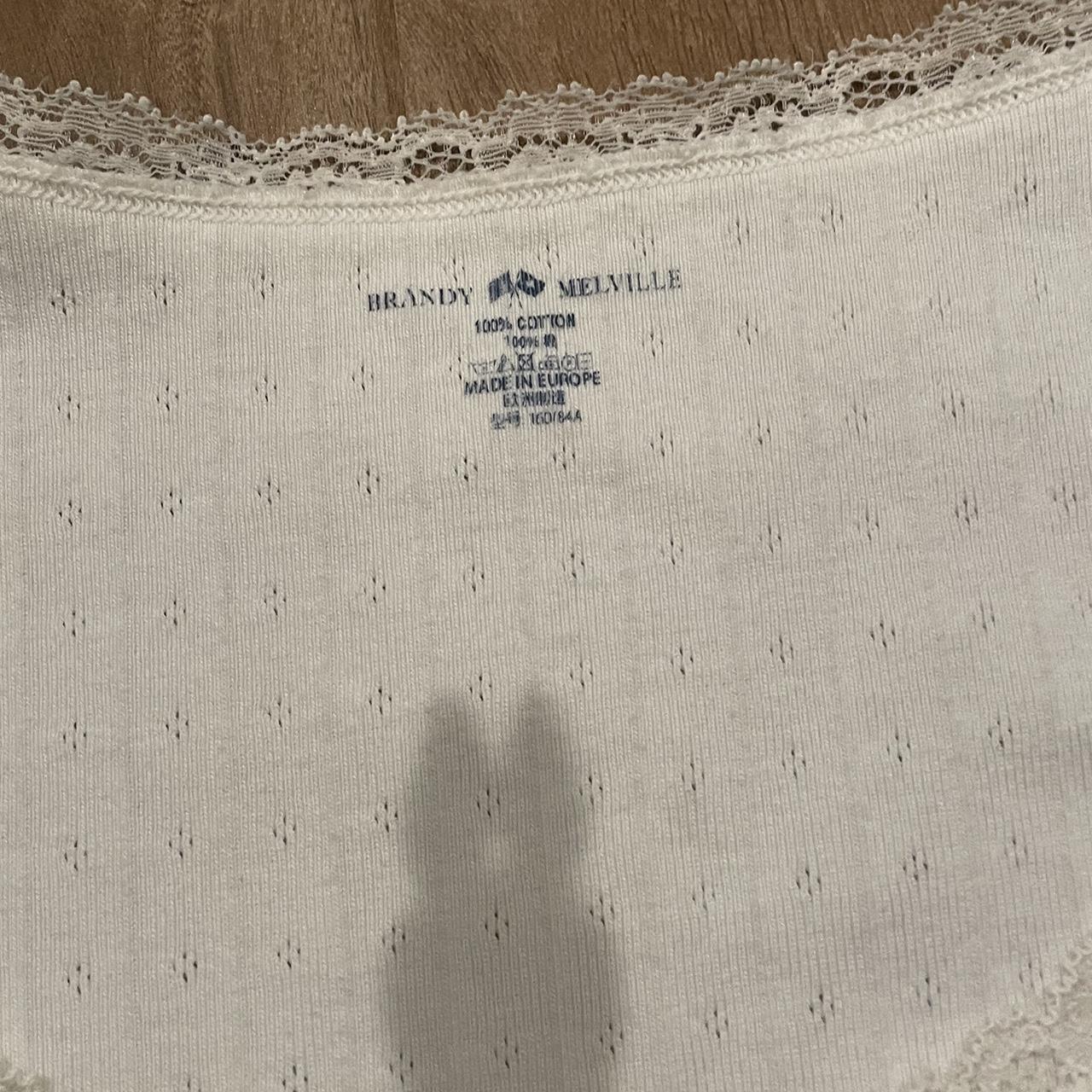 Brandy Melville McKenna Eyelet Bow Top in great... Depop