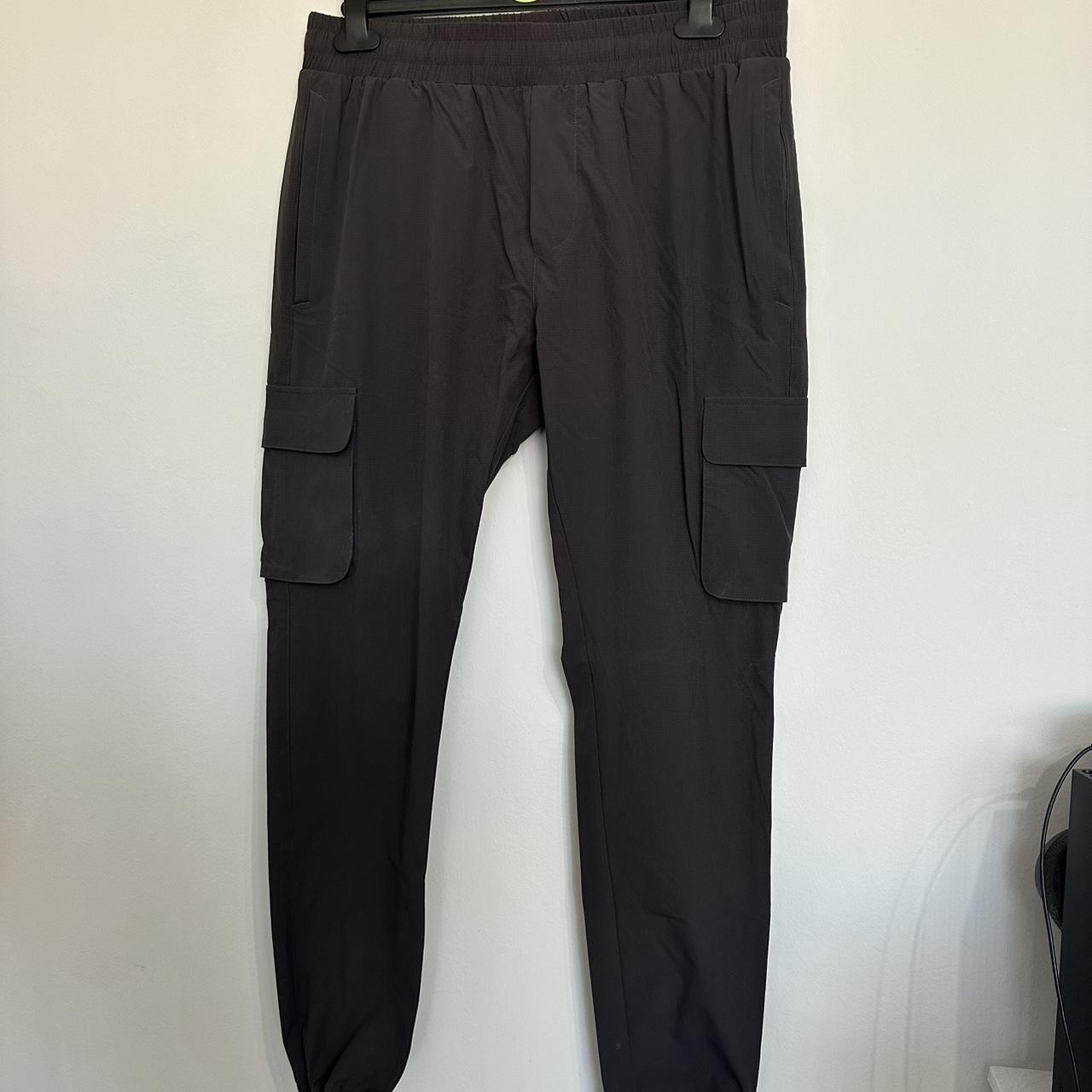 ARNE cargo trousers with pull cuffs. Size medium in... - Depop