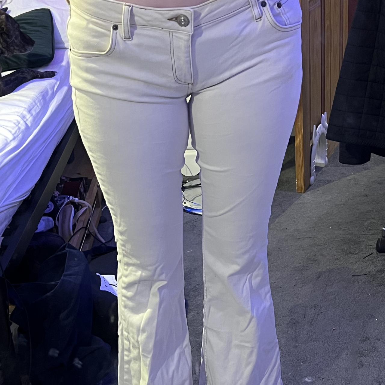 BDG low rise cream flare jeans size 32 never... Depop
