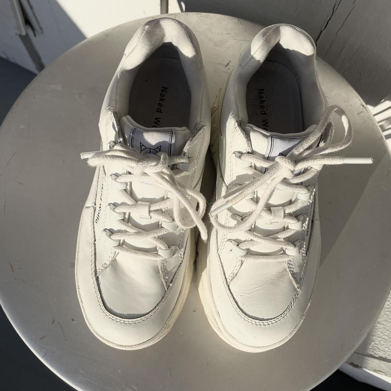 Naked Wolfe Women's White Trainers | Depop