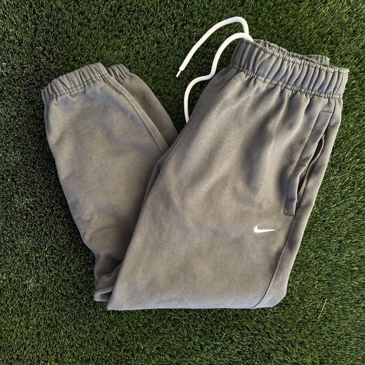 Nike Dark Grey Sweatpants SizeS zip up pockets... - Depop