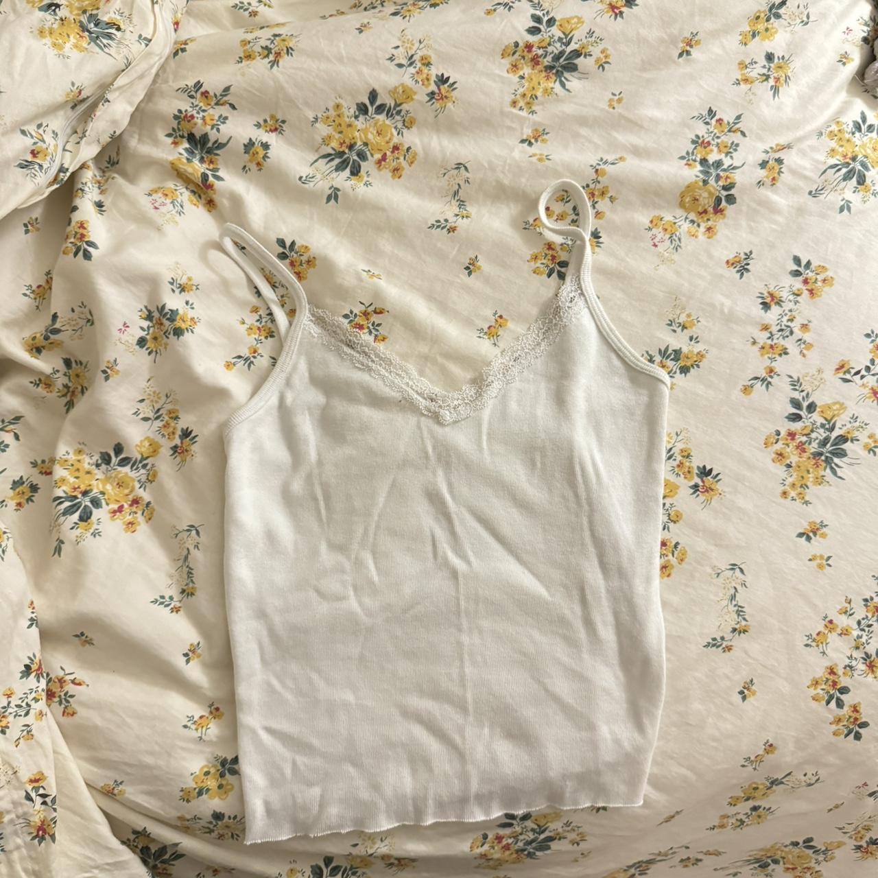 Super cute white brandy melville tank with lace in - Depop