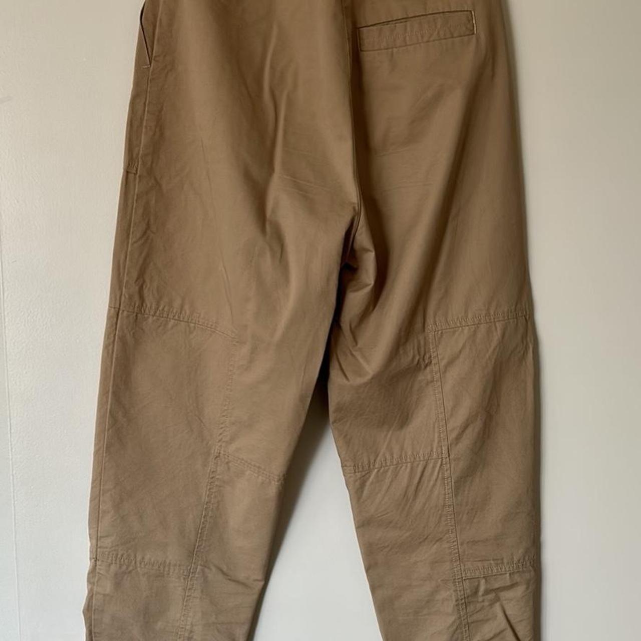 Nique beige cropped pants Bought from a sample... - Depop