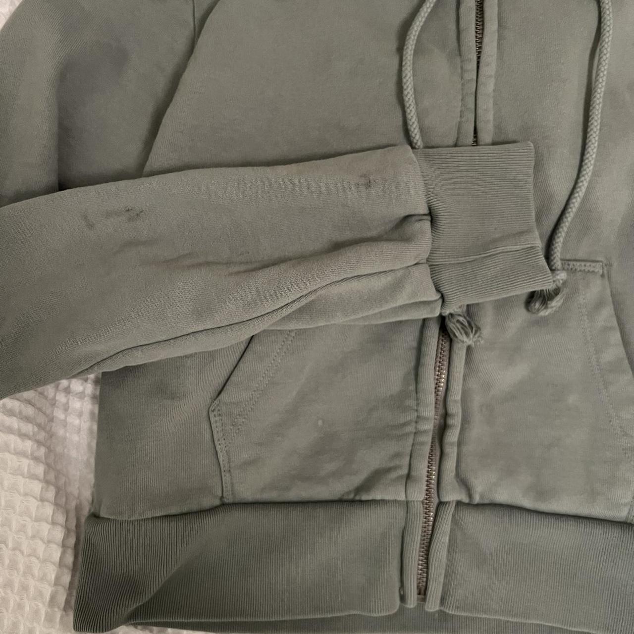 Green brandy melville cropped zip up hoodie... - Depop