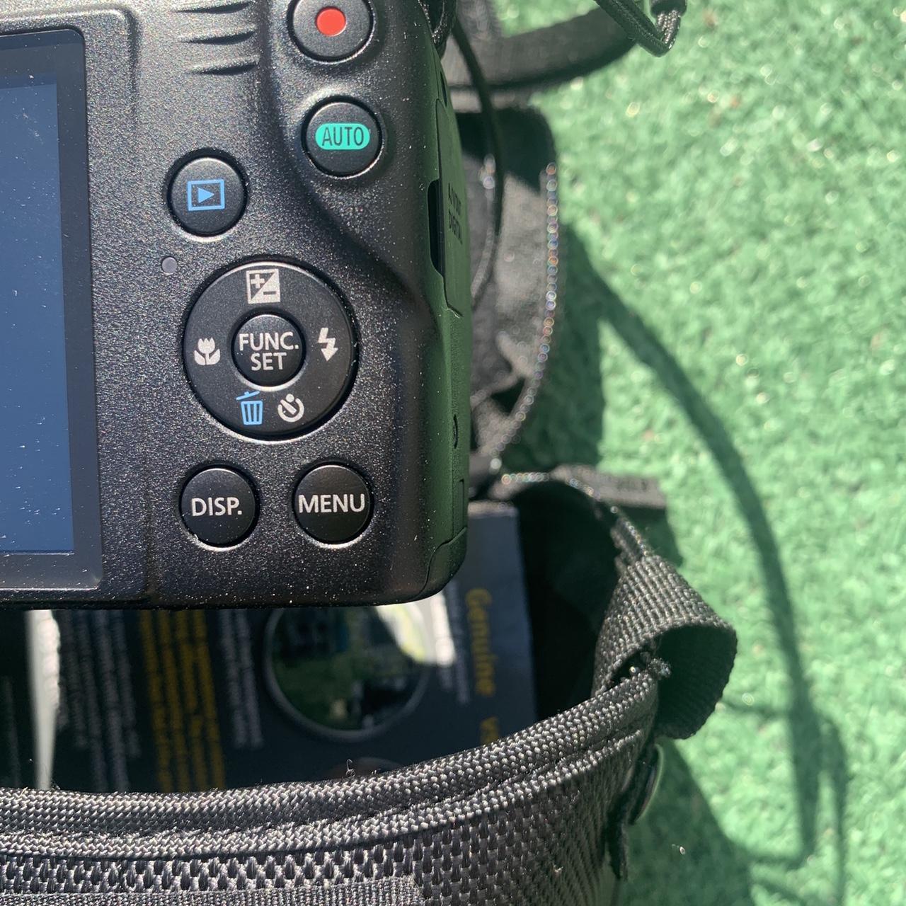 Canon camera with case. This camera and case are... Depop