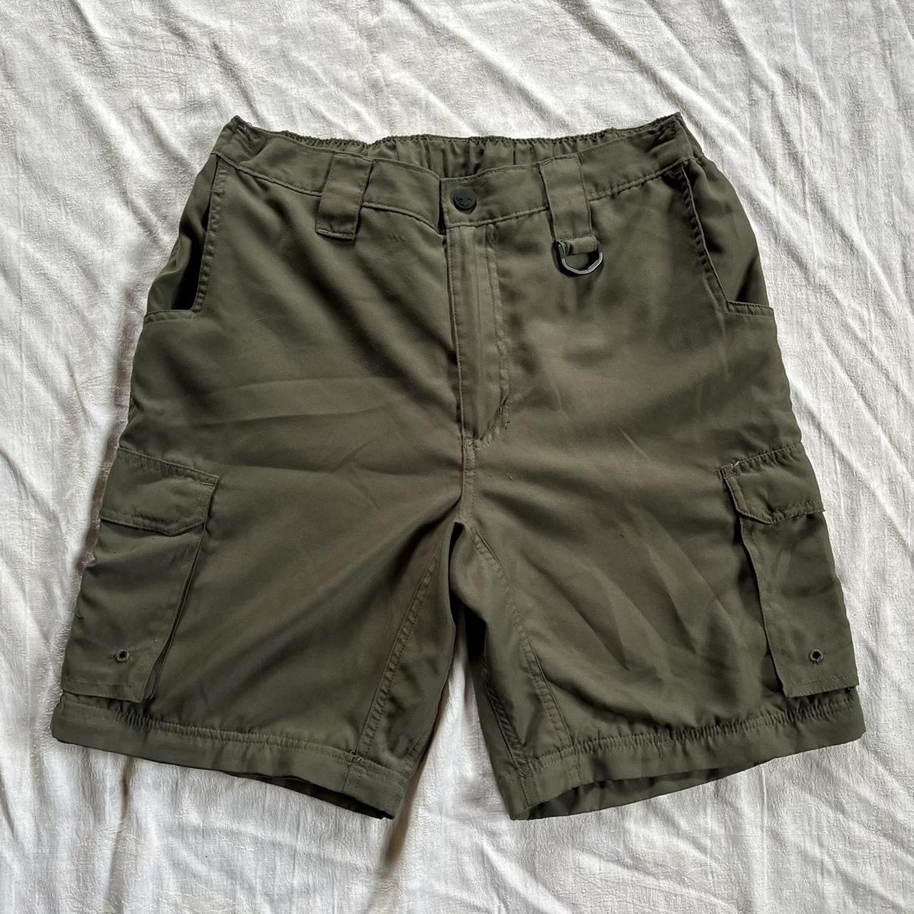 Green cargo long shorts size small. Hole in back... - Depop