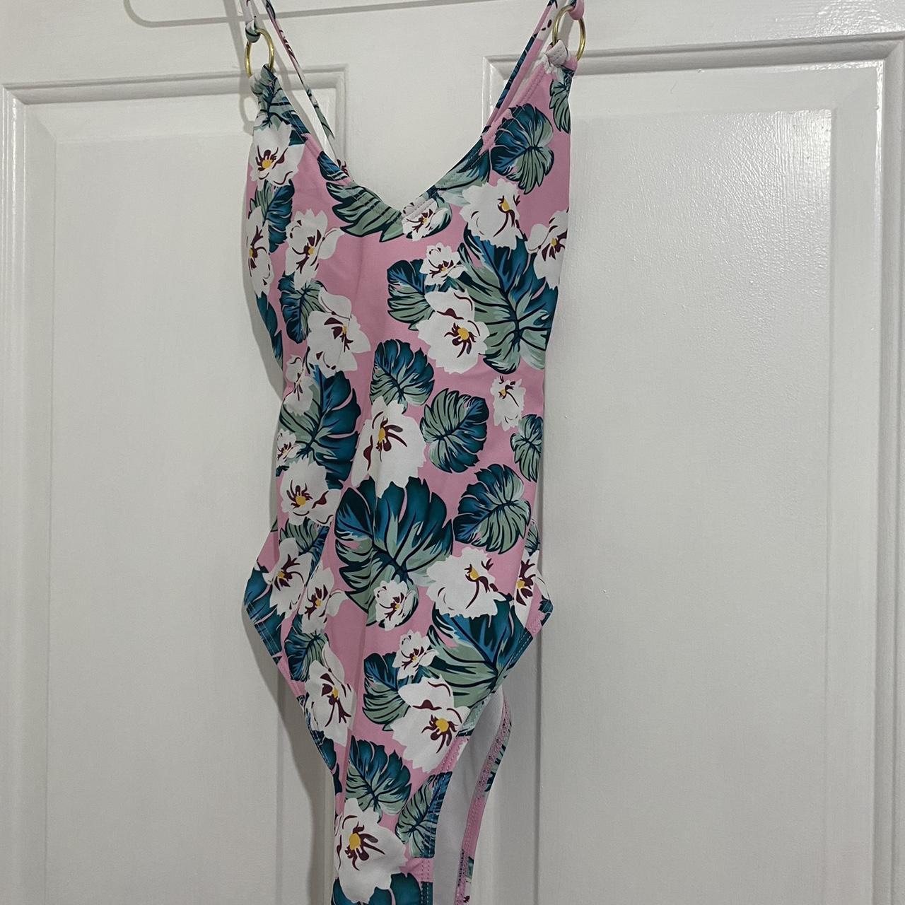 Pink floral tie-back swimming costume swimsuit with... - Depop