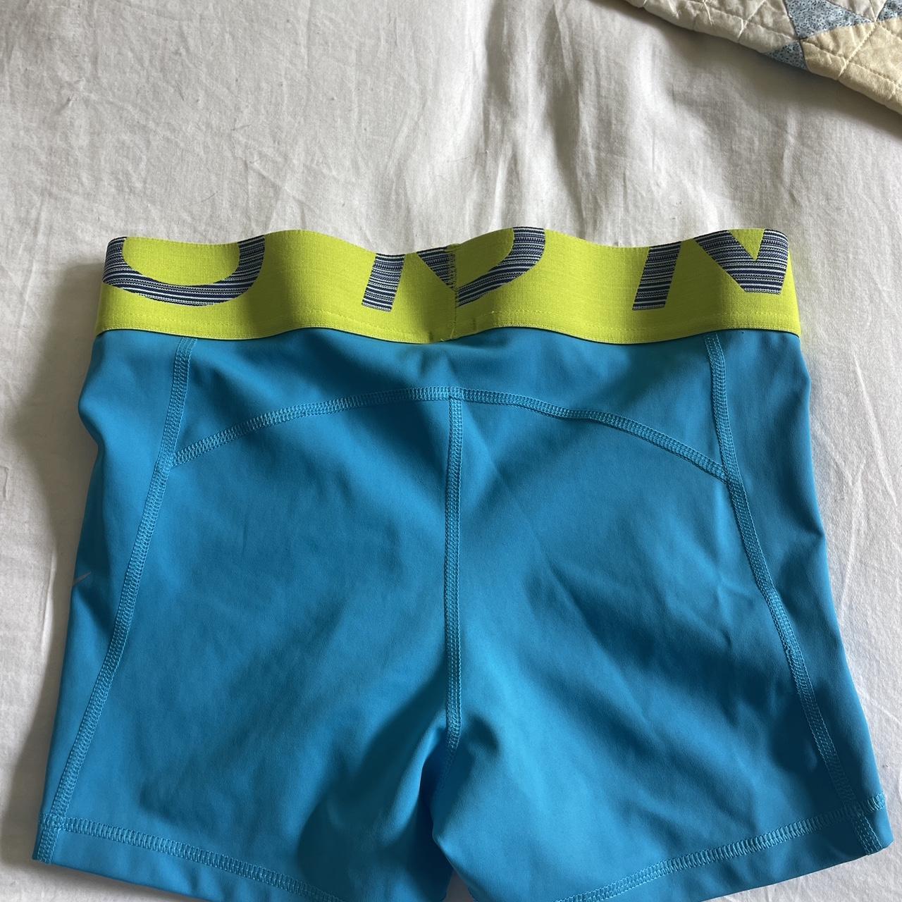 nike pro shorts blue and green