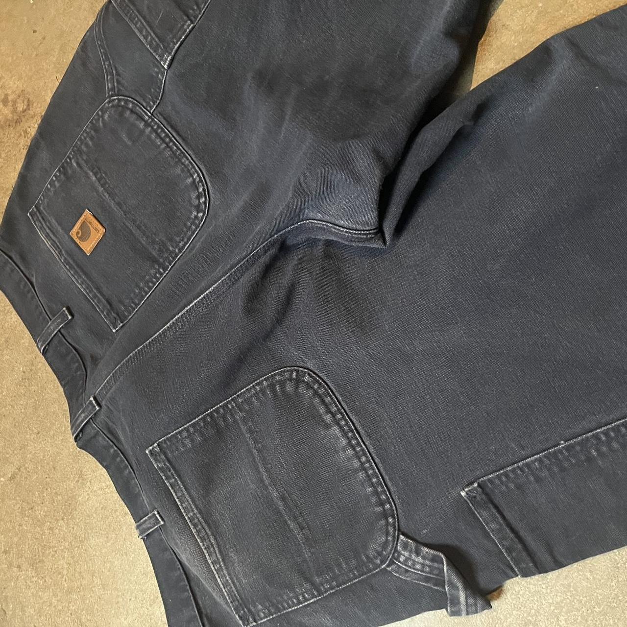 Thrifted Carhartt pants. Missing size tag. Fits like... - Depop