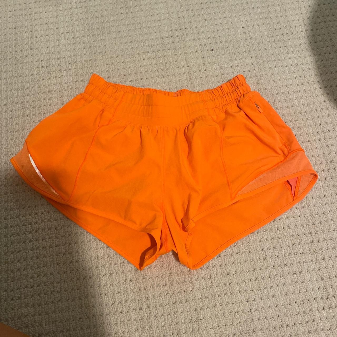 Orange Lululemon hotty hot shorts!! Size 4, 2.5”... - Depop