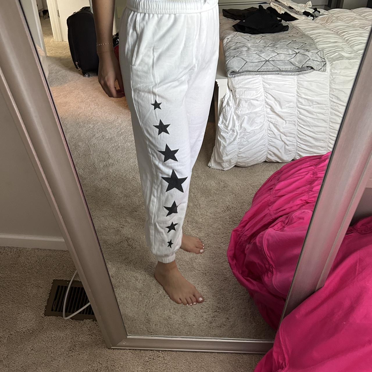 White sweatpants with discount stars