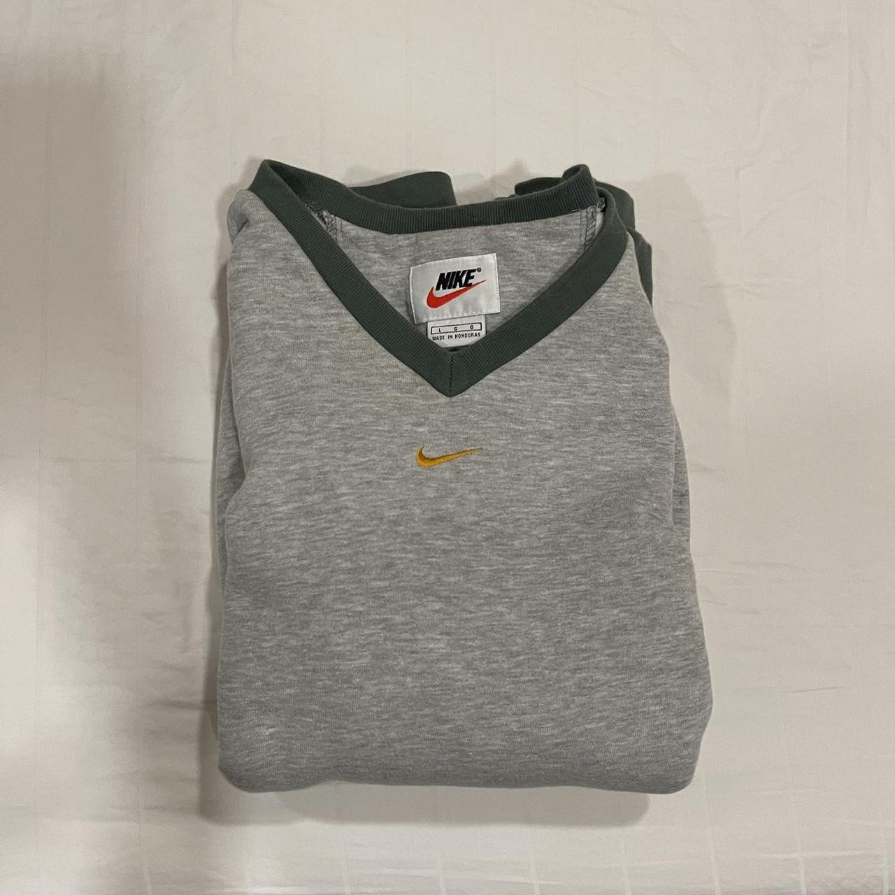 Gray middle swoosh Nike crew neck with green Depop