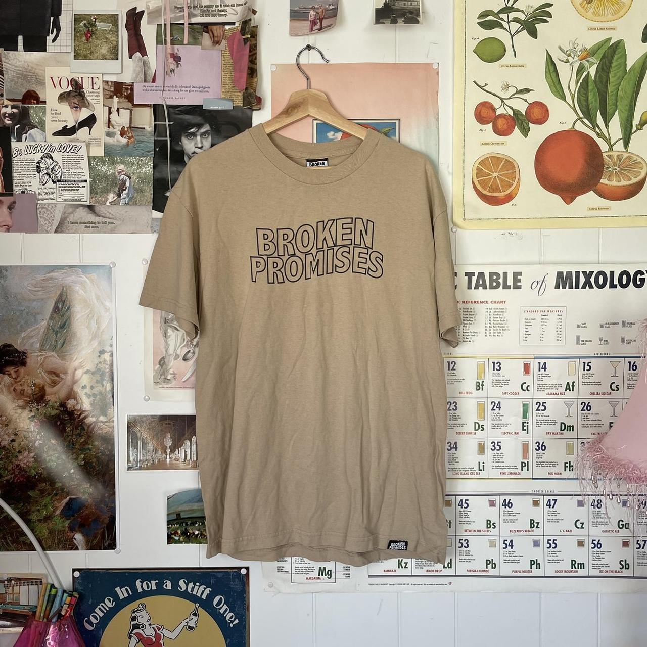 large tan broken promises grapic tee shirt. - Depop