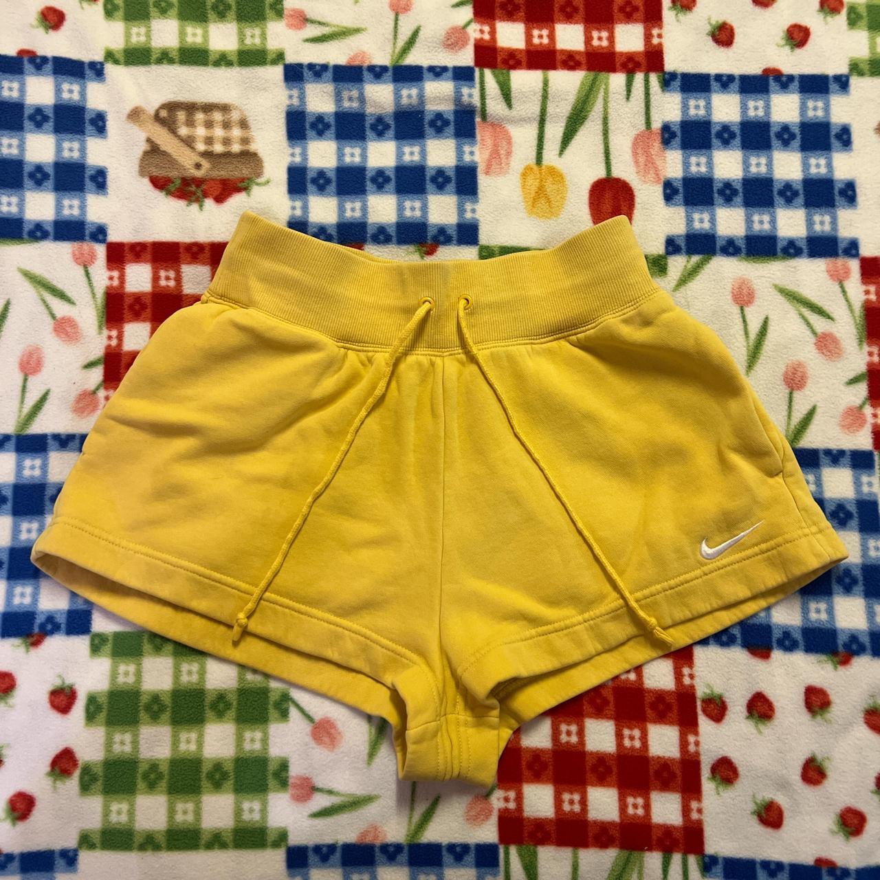 Nike fleece shorts yellow best sale