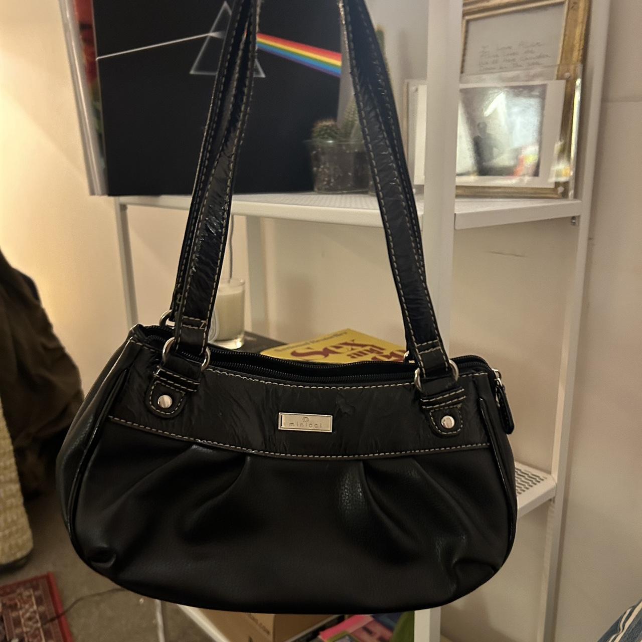 black mini purse. super cute and has a decent amount... - Depop