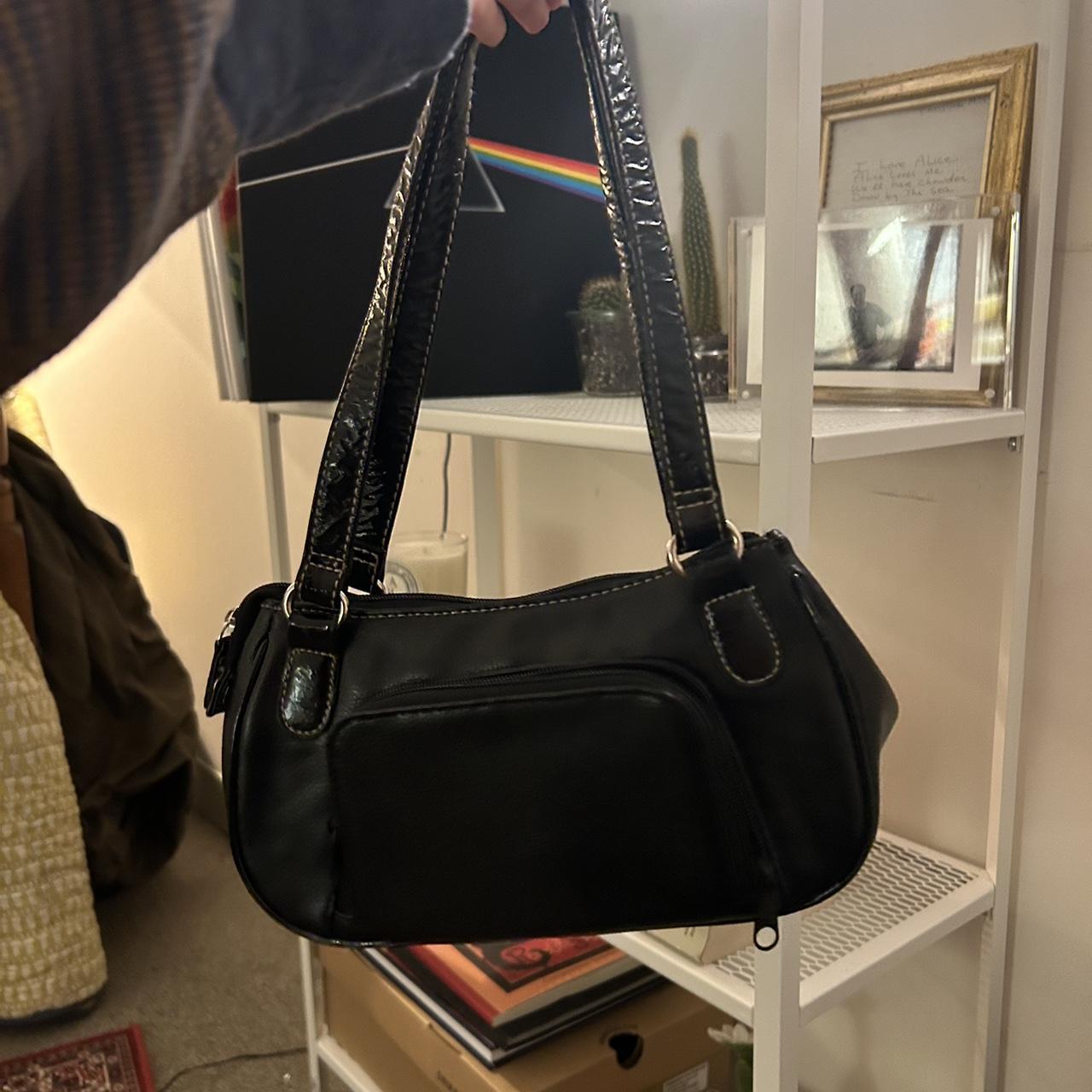 black mini purse. super cute and has a decent amount... - Depop