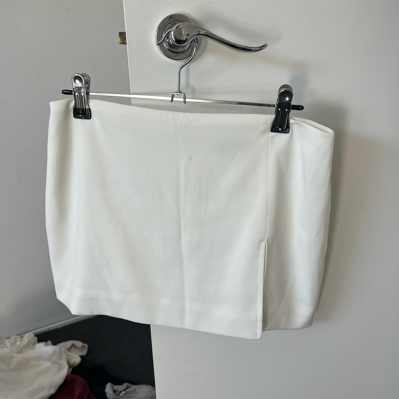 white mini skirt super perfect tiny stain but will... - Depop