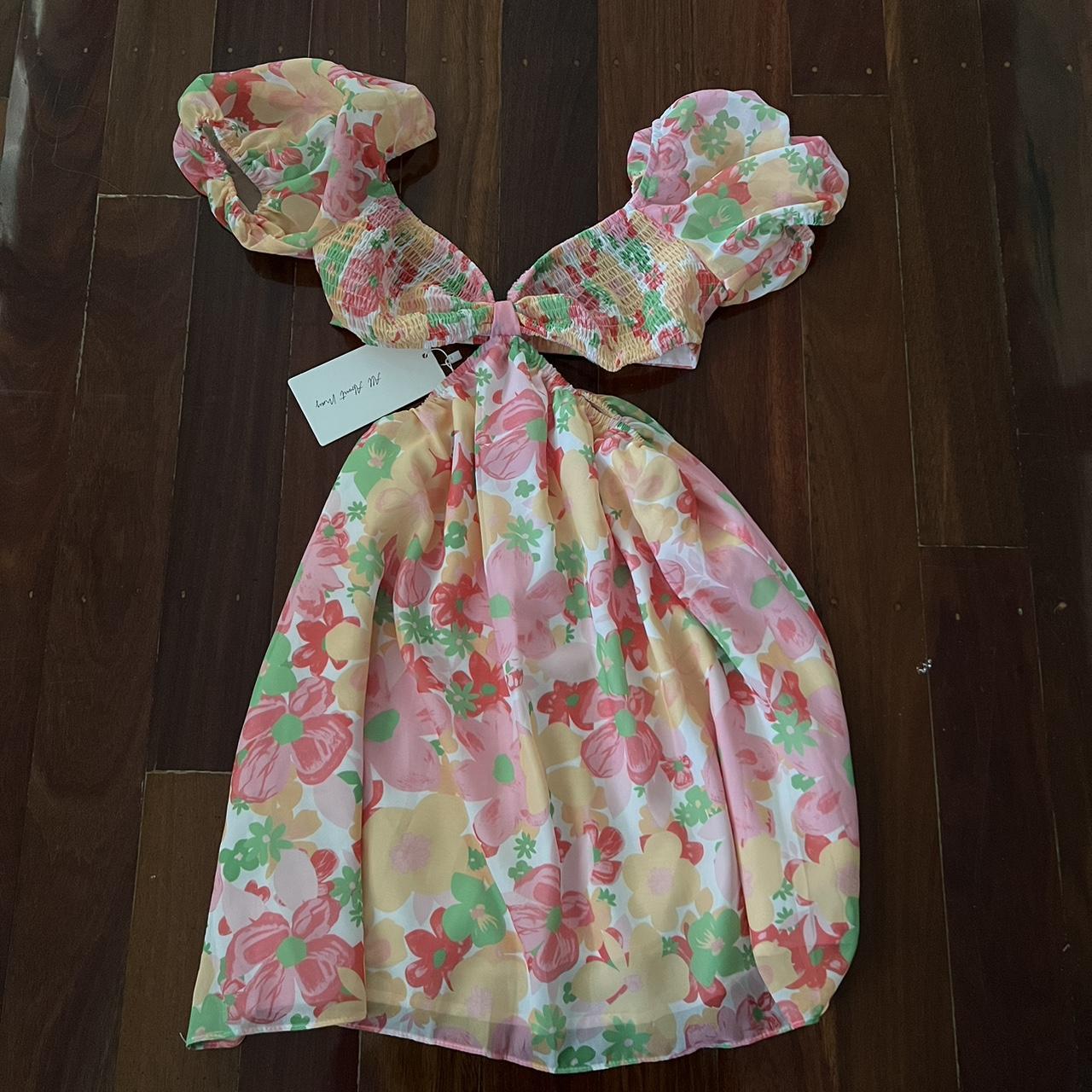 Floral mini cutout dress Bought from Billy J... - Depop