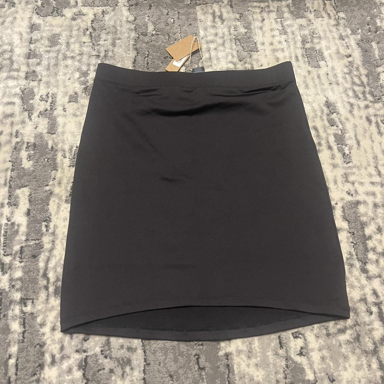 Skims Women's Black Skirt | Depop