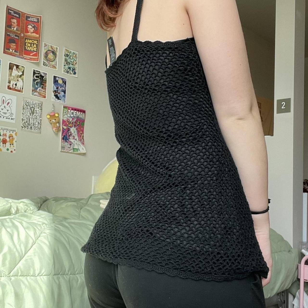 black crochet tank top with white flower detailing!... Depop