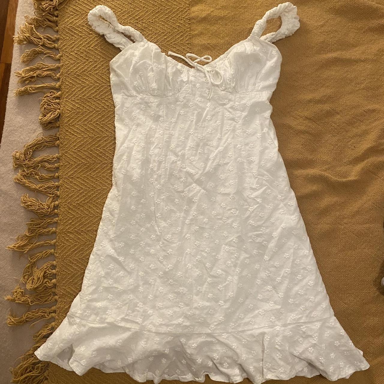 LUCK & TROUBLE White mini dress with flower... - Depop