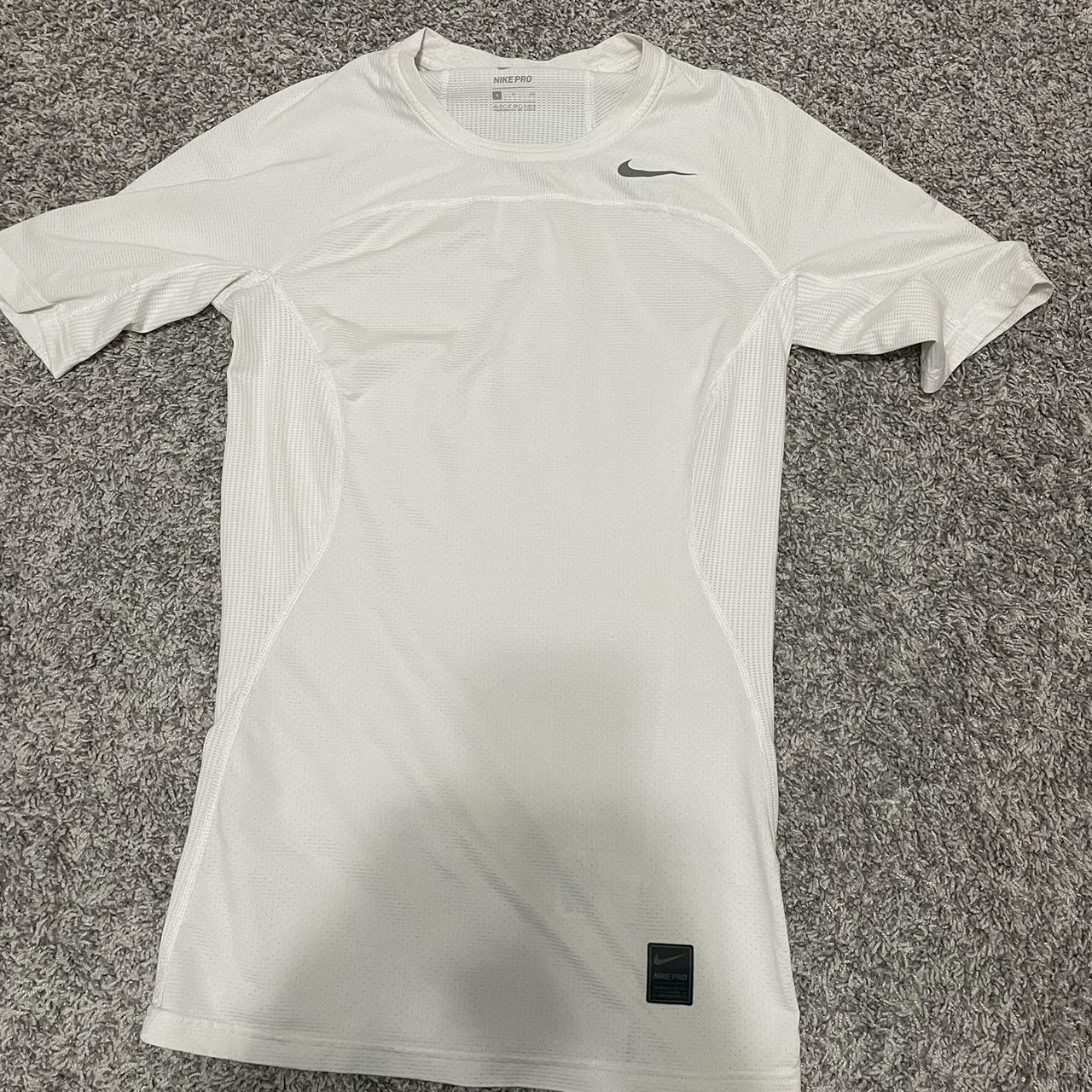 nike pro white undershirt. size small. has a few... Depop