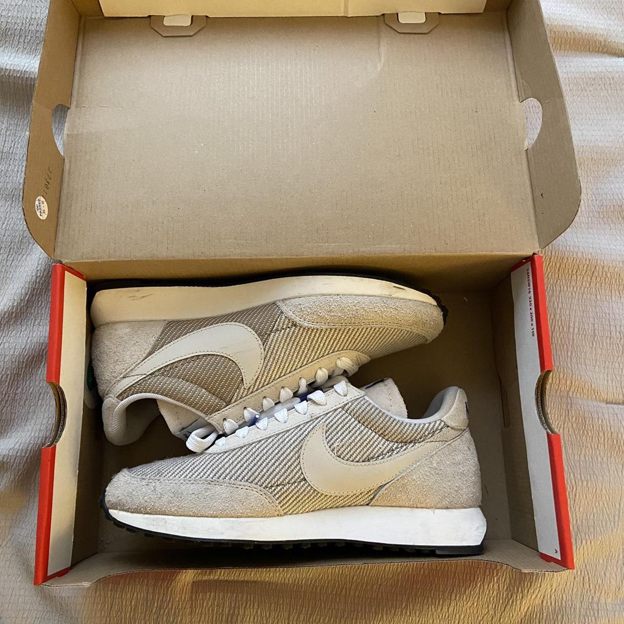 size nike tailwind 79