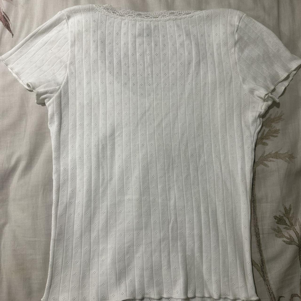 Brandy Melville Women's White T-shirt | Depop