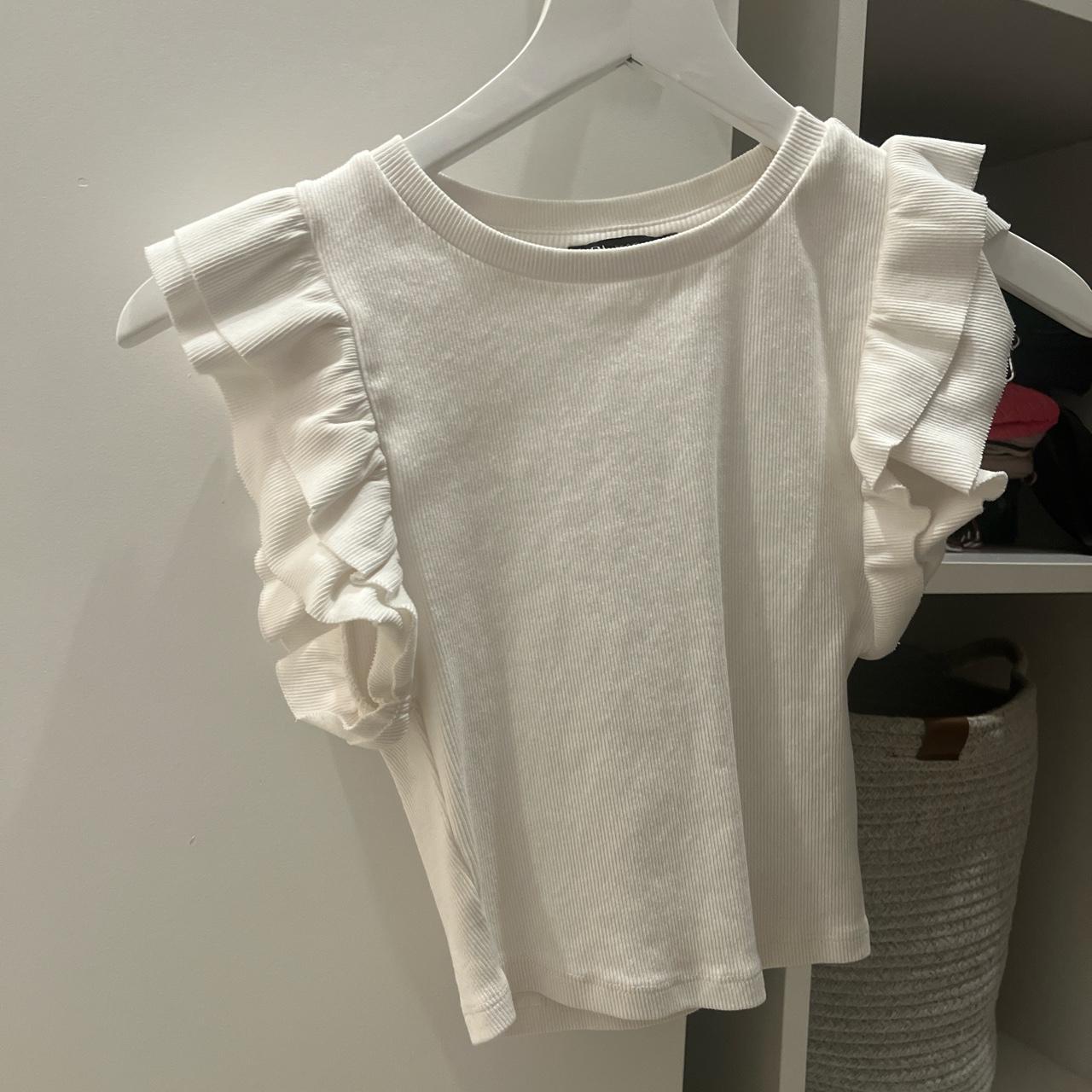 white ruffle top from ZARA! bought for 35 selling... - Depop