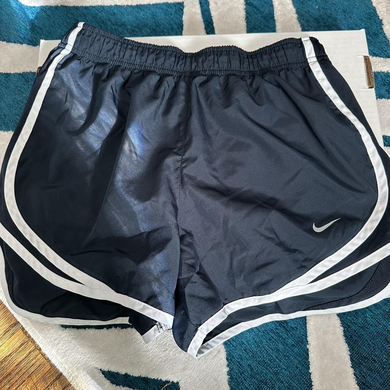 Nike navy blue running shorts in a size small. They... - Depop