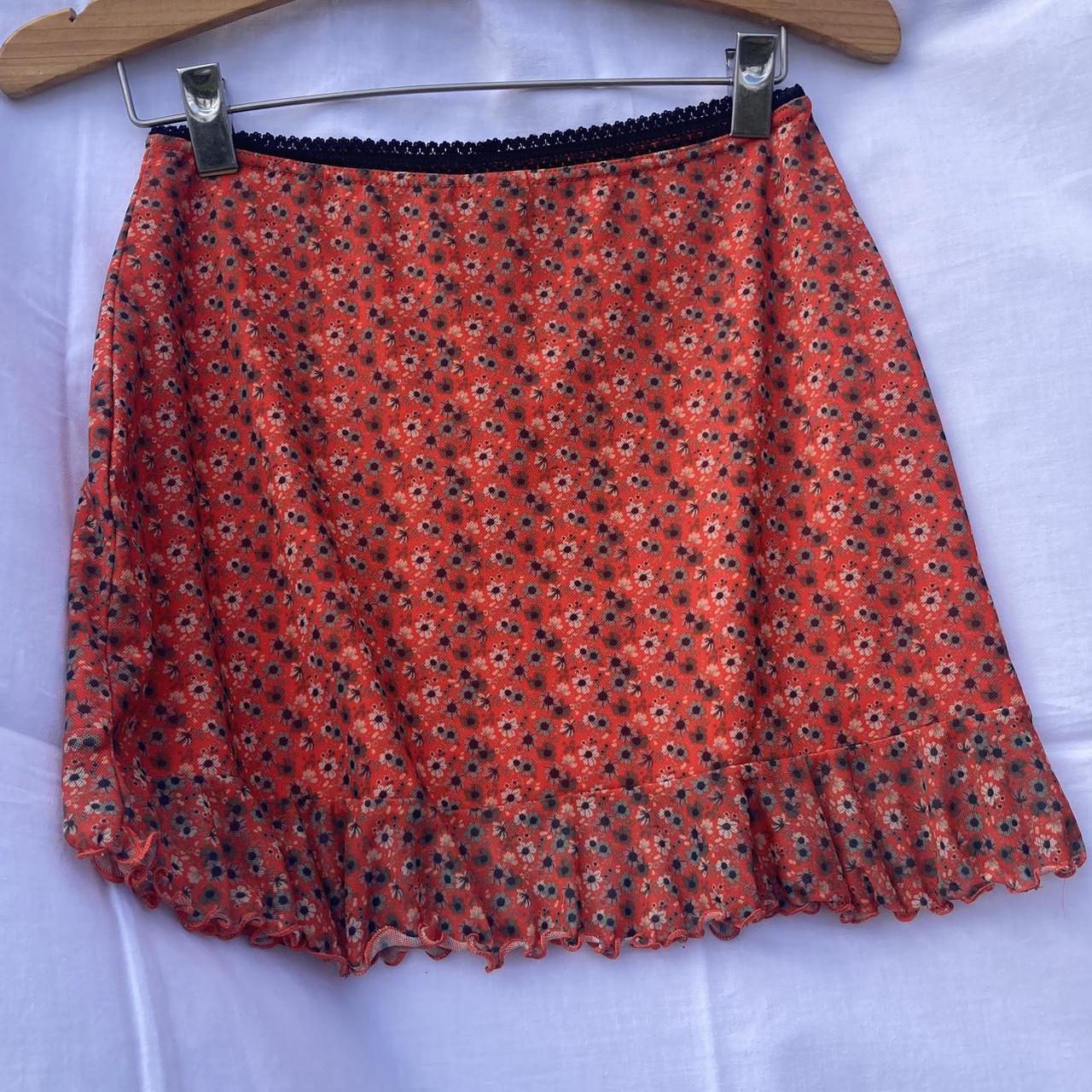 Really pretty urban outfitters orange floral mesh... - Depop