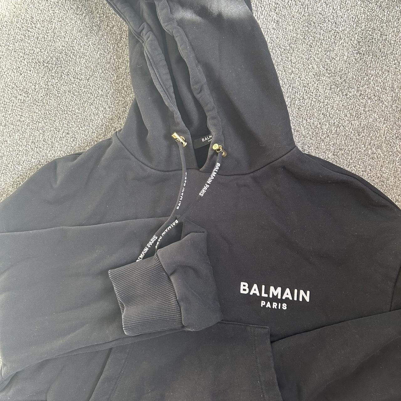 Black cropped genuine balmain hoodie. Worn a handful... - Depop